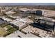 An aerial view captures the shopping mall and cityscape with the Las Vegas ballpark in the distance at 1901 Shady Elm St, Las Vegas, NV 89135