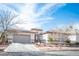 Charming single-story home with desert landscaping and a spacious three-car garage at 1901 Shady Elm St, Las Vegas, NV 89135