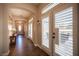 Inviting hallway with stylish wood floors leading to the living areas and bedrooms at 1901 Shady Elm St, Las Vegas, NV 89135