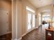 Inviting hallway with stylish wood floors leading to the living areas and bedrooms at 1901 Shady Elm St, Las Vegas, NV 89135