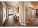 Inviting hallway with stylish wood floors leading to the living areas and bedrooms at 1901 Shady Elm St, Las Vegas, NV 89135