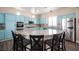 Well-equipped kitchen with granite counters, stainless steel appliances, and a large central island at 1901 Shady Elm St, Las Vegas, NV 89135