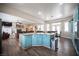 Open-concept kitchen featuring a large island, stainless steel appliances, and seamless flow to living area at 1901 Shady Elm St, Las Vegas, NV 89135