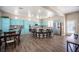 Spacious kitchen with large island, stainless steel appliances, and stylish blue cabinetry at 1901 Shady Elm St, Las Vegas, NV 89135