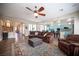 Spacious living room with hardwood floors, seamlessly connected to the kitchen and dining area at 1901 Shady Elm St, Las Vegas, NV 89135