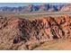 Stunning aerial view of Red Rocks landscape featuring a mountainous vista and unique rocky terrain in Nevada at 1901 Shady Elm St, Las Vegas, NV 89135