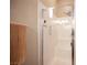 Clean bathroom with a shower stall featuring a tile surround and glass door at 1901 Shady Elm St, Las Vegas, NV 89135