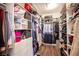 Organized walk-in closet with custom shelving providing ample storage space for clothes and accessories at 1901 Shady Elm St, Las Vegas, NV 89135