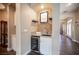 Charming wet bar area with a wine refrigerator, sink, and stylish backsplash at 1901 Shady Elm St, Las Vegas, NV 89135