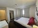 Cozy bedroom with a queen-size bed and mirrored closet at 200 N Bruce St # A, Las Vegas, NV 89101