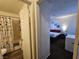 View of bedroom and bathroom with matching decor at 200 N Bruce St # A, Las Vegas, NV 89101