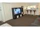 Living room with TV stand and comfortable seating area at 200 N Bruce St # A, Las Vegas, NV 89101