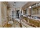 Elegant bathroom with double vanity and walk-in shower at 2049 Troon Dr, Henderson, NV 89074