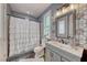 Clean bathroom with updated vanity and shower/tub combo at 2049 Troon Dr, Henderson, NV 89074