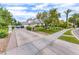 Spacious driveway with landscaping and two-car garage at 2049 Troon Dr, Henderson, NV 89074