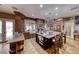 Large kitchen with island, ample cabinetry, and hardwood floors at 2049 Troon Dr, Henderson, NV 89074
