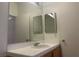 Bathroom with vanity, mirror and tiled walls at 2110 Los Feliz St # 1046, Las Vegas, NV 89156