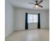 Spacious bedroom with ceiling fan and access to bathroom at 2110 Los Feliz St # 1046, Las Vegas, NV 89156