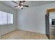 Bright dining area with tile floor and ceiling fan at 2110 Los Feliz St # 1046, Las Vegas, NV 89156