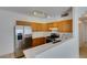 Bright kitchen with stainless steel appliances and light wood cabinets at 2110 Los Feliz St # 1046, Las Vegas, NV 89156
