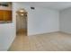 Open living area with tile floors and kitchen view at 2110 Los Feliz St # 1046, Las Vegas, NV 89156