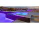 Relaxing spa with purple lighting integrated into the pool at 2153 King Crest Ct, Henderson, NV 89052