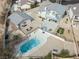 Aerial view of the home showcasing the pool, patio, and desert landscaping at 2327 River City Dr, Laughlin, NV 89029