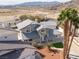 Expansive aerial view highlighting the home's landscaping and desirable location with mountains in the distance at 2327 River City Dr, Laughlin, NV 89029