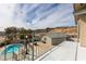 Balcony view of a beautiful pool and desert mountains in the distance at 2327 River City Dr, Laughlin, NV 89029