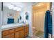 Bright bathroom featuring a modern vanity, stylish lighting, and a shower with tub at 2327 River City Dr, Laughlin, NV 89029