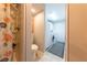 Bathroom with shower adjacent to laundry room with washer and dryer at 2327 River City Dr, Laughlin, NV 89029