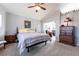 Spacious bedroom featuring neutral carpet, natural lighting and a ceiling fan at 2327 River City Dr, Laughlin, NV 89029