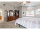 Primary bedroom with vaulted ceilings, neutral carpet, and ensuite bathroom at 2327 River City Dr, Laughlin, NV 89029