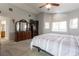 Primary bedroom with vaulted ceilings, neutral carpet, and ensuite bathroom at 2327 River City Dr, Laughlin, NV 89029