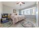 Bedroom featuring a large window seat and a ceiling fan at 2327 River City Dr, Laughlin, NV 89029