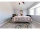 Bedroom features a large window seat and a ceiling fan at 2327 River City Dr, Laughlin, NV 89029