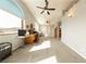 Large bonus room with multiple ceiling fans, computers and work spaces at 2327 River City Dr, Laughlin, NV 89029