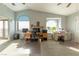 Large bonus room with multiple ceiling fans, computers and work spaces at 2327 River City Dr, Laughlin, NV 89029