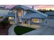 Charming home boasts a well-manicured lawn, tiled roof, and inviting entrance, enhancing its curb appeal at 2327 River City Dr, Laughlin, NV 89029