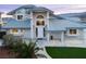 Charming home boasts a well-manicured lawn, tiled roof, and inviting entrance, enhancing its curb appeal at 2327 River City Dr, Laughlin, NV 89029