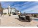 Rear exterior view showcasing the outdoor patio, mountain view and private pool at 2327 River City Dr, Laughlin, NV 89029
