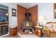 Living room with a fireplace, side table, and accent lighting at 2327 River City Dr, Laughlin, NV 89029