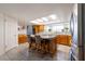 Spacious kitchen featuring an island with seating, stainless steel appliances, and plenty of natural light at 2327 River City Dr, Laughlin, NV 89029