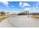 Community basketball court and playground surrounded by residential buildings under a bright sky at 3558 Herodain Ave, Las Vegas, NV 89106