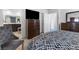 Stylish bedroom featuring a television, dresser, and ensuite bathroom with double vanity at 3558 Herodain Ave, Las Vegas, NV 89106