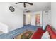 Bedroom with a futon, blue carpet, and access to a full bathroom at 3558 Herodain Ave, Las Vegas, NV 89106