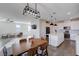 Open concept design with a spacious kitchen, dining area, and living room at 422 Barcarolle Ln, Henderson, NV 89011