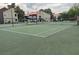 Two well-maintained tennis courts at 5002 S Rainbow Blvd # 106, Las Vegas, NV 89118