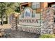 Charming stone and wood community sign for Montana neighborhood entrance at 555 E Silverado Ranch Blvd # 2086, Las Vegas, NV 89183