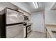 Efficient kitchen featuring stainless steel appliances, microwave, and tan countertops at 555 E Silverado Ranch Blvd # 2086, Las Vegas, NV 89183